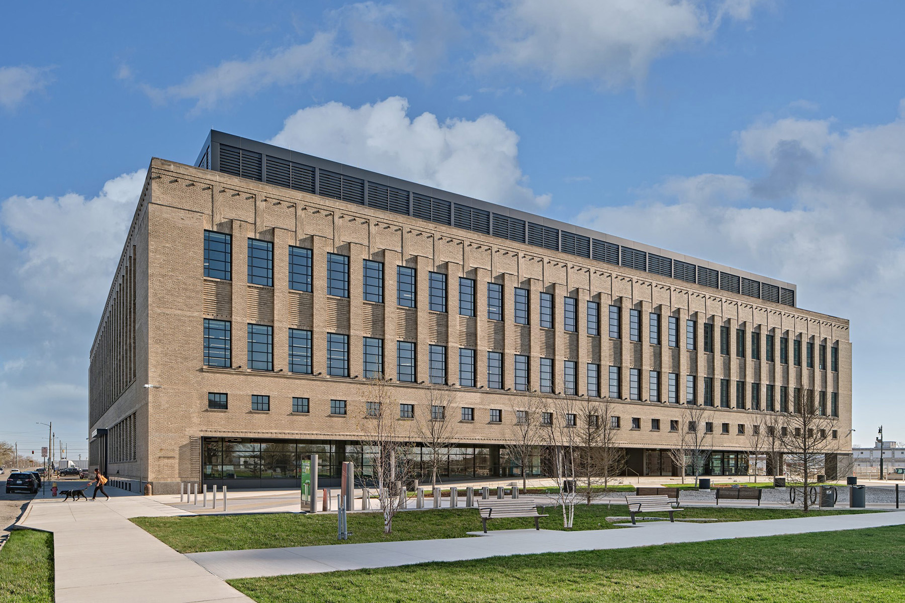 The former book depository, a low-rise structure, is shown after its renovation into the Newlab building.