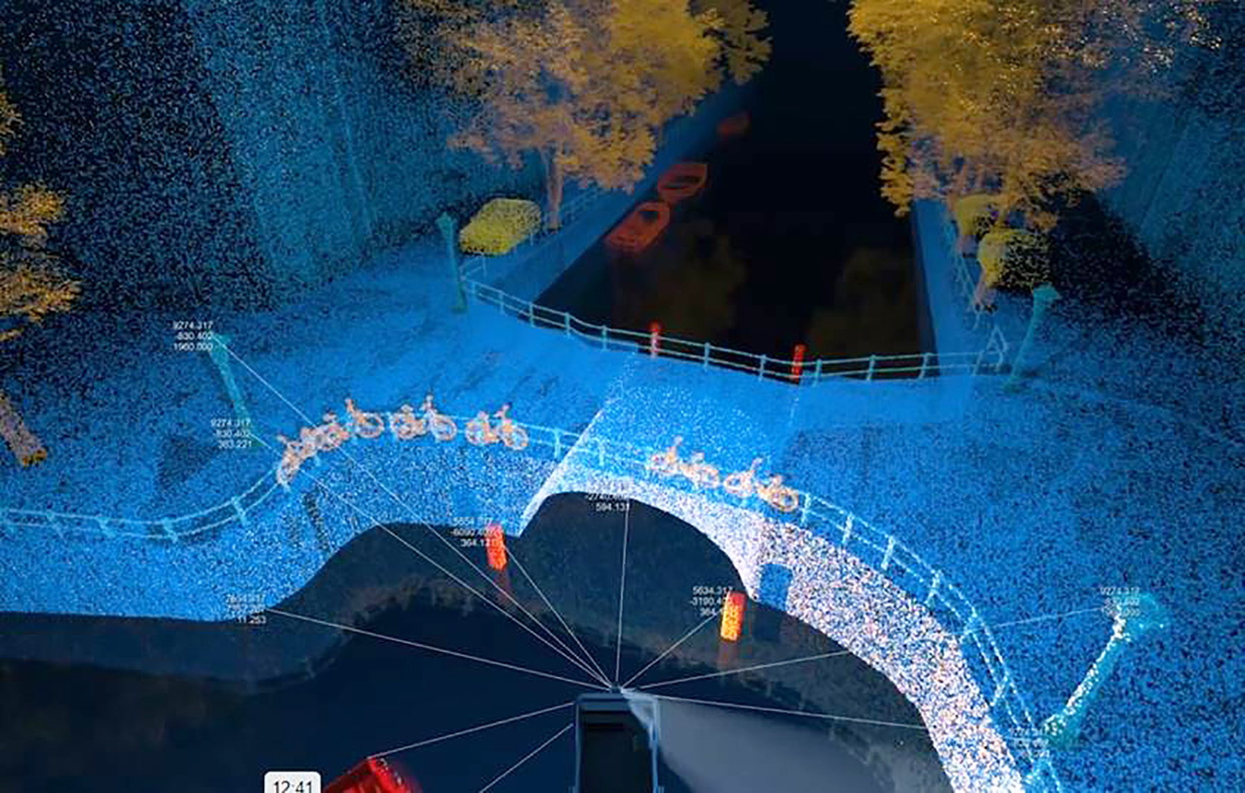 A bridge in Amsterdam is depicted in blue light via lidar from an autonomous boat.